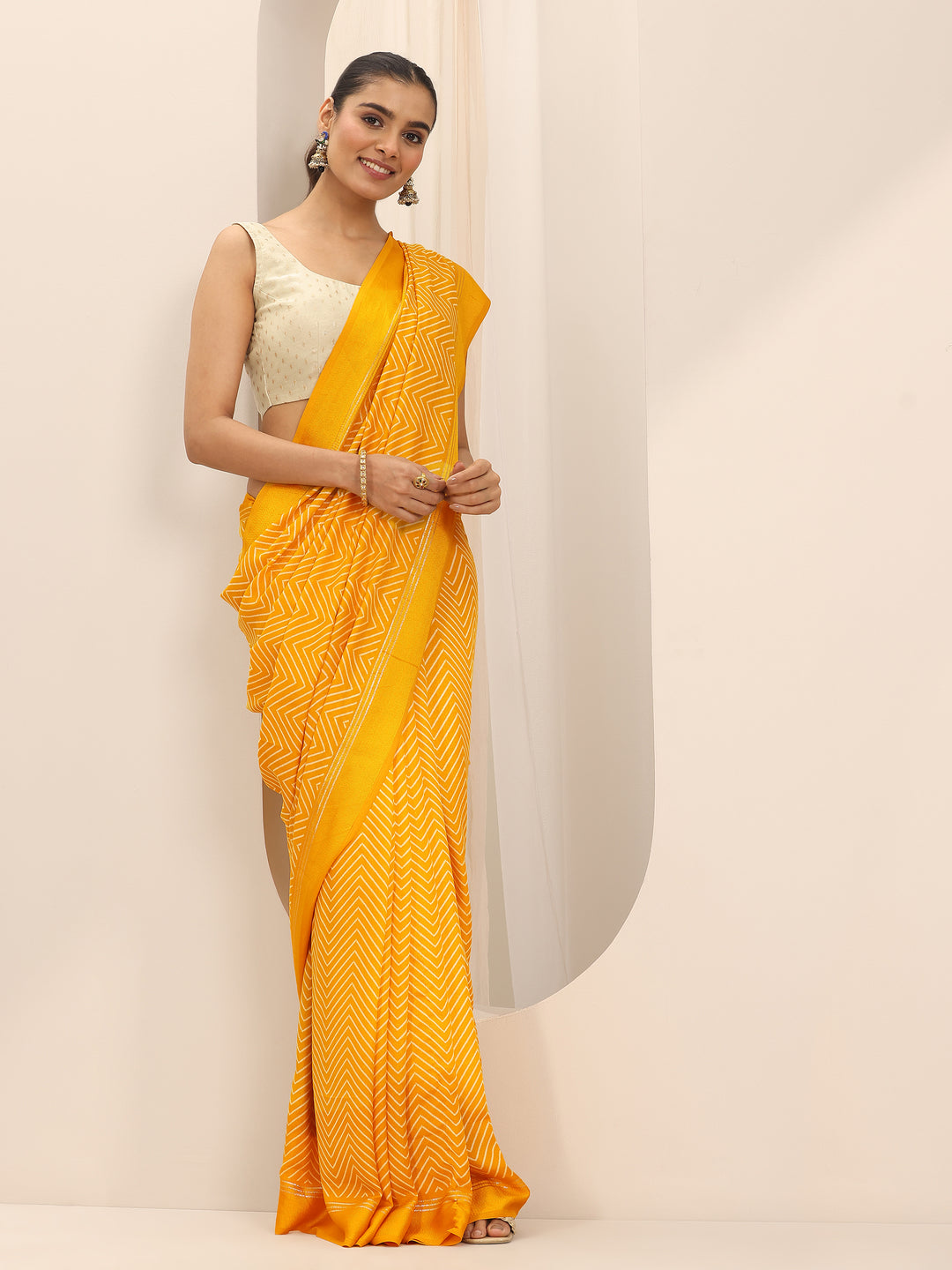 Mustard Printed Georgette Saree With Unstitched Blouse Piece