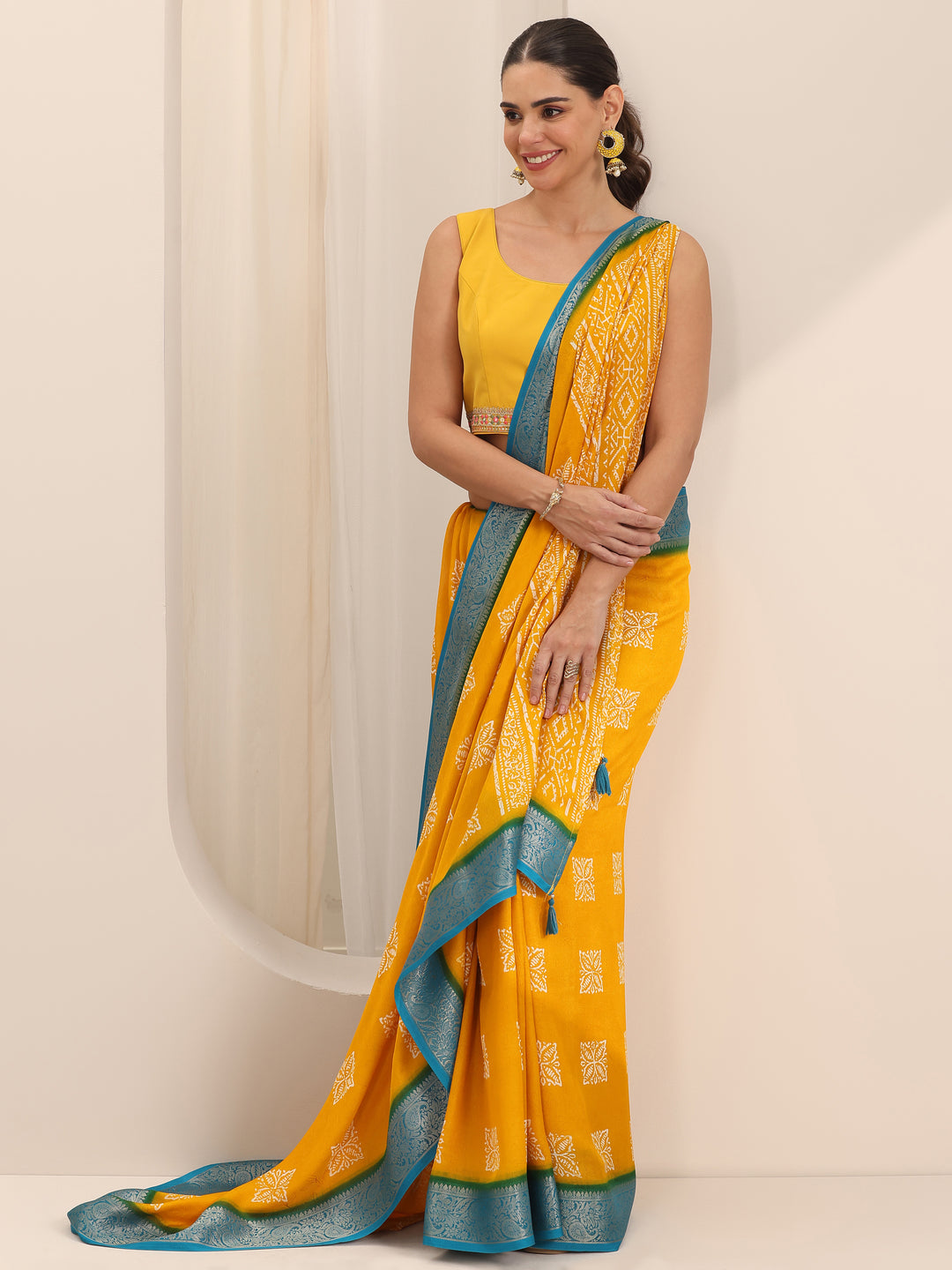 Mustard Printed Georgette Saree With Unstitched Blouse Piece