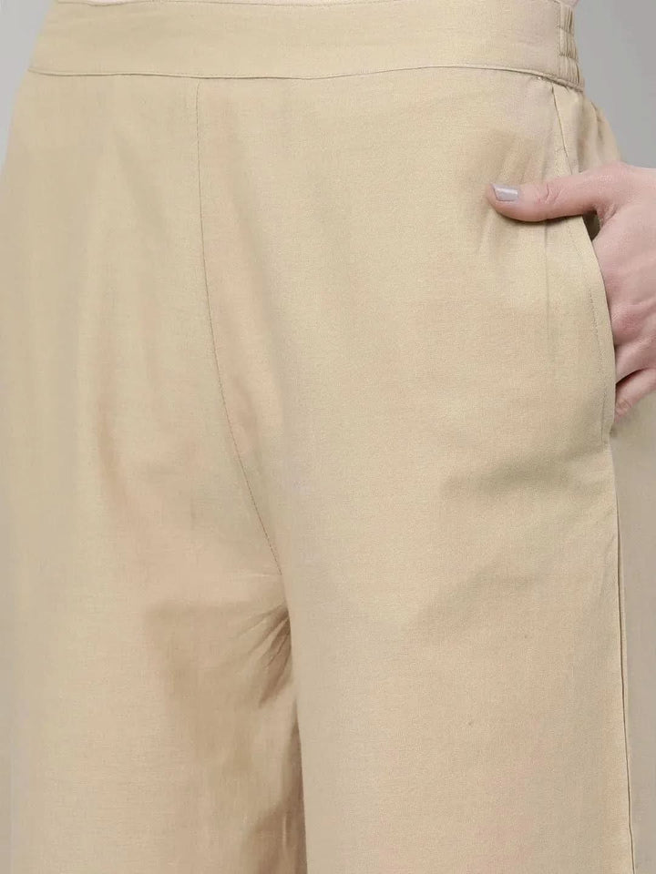 Beige Solid Cotton Palazzos - Libas
