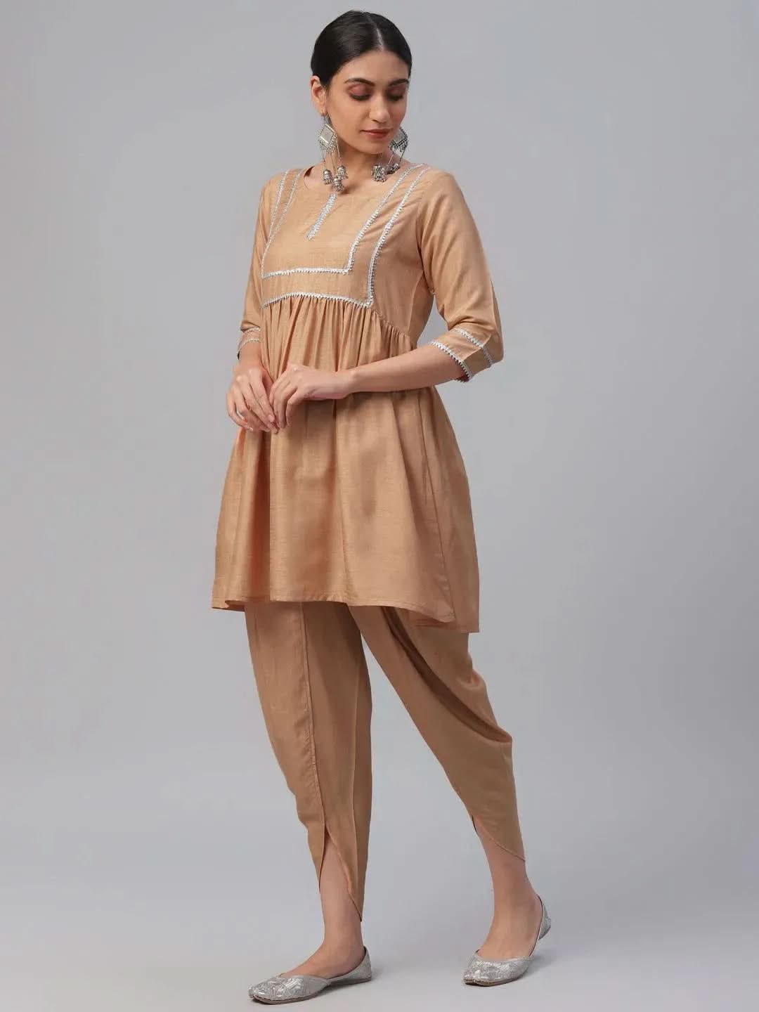 Beige Solid Polyester A-Line Kurta With Dhoti Pant & Dupatta
Beige Solid Polyester A-Line Kurta With Dhoti Pant & Dupatta