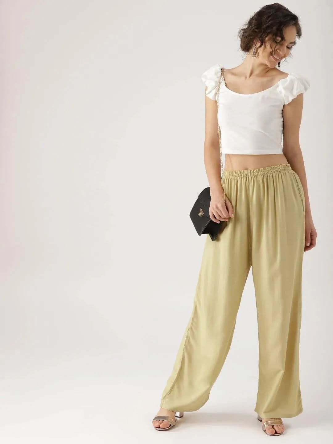 Beige Solid Rayon Palazzos
Beige Solid Rayon Palazzos