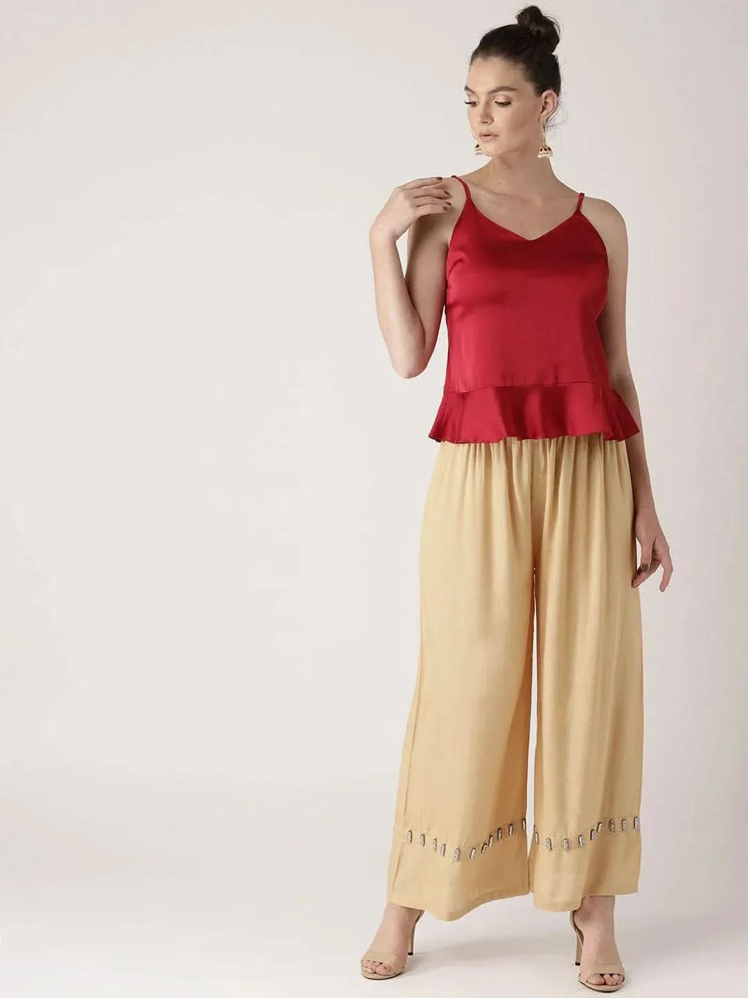 Beige Solid Rayon Palazzos
Beige Solid Rayon Palazzos