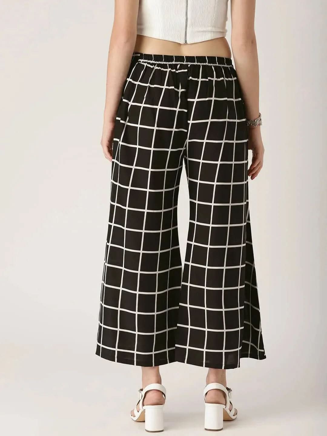 Buy Black Checkered Crepe Palazzos - PL513-XL | Libas Ethnic Wear Online
Buy Black Checkered Crepe Palazzos - PL513-XL | Libas Ethnic Wear Online