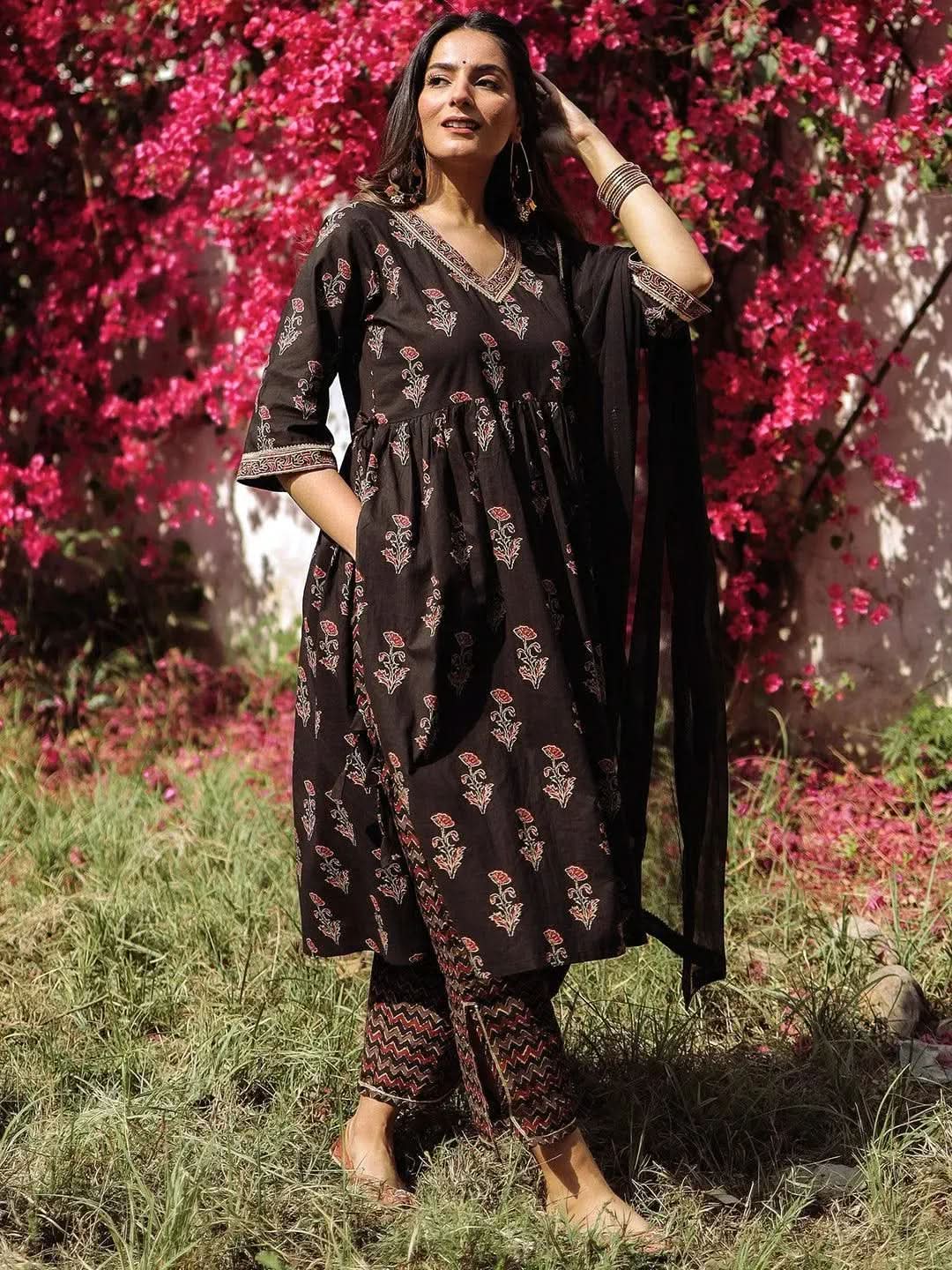 Black Printed Cotton A-Line Kurta With Trousers & Dupatta
Black Printed Cotton A-Line Kurta With Trousers & Dupatta
