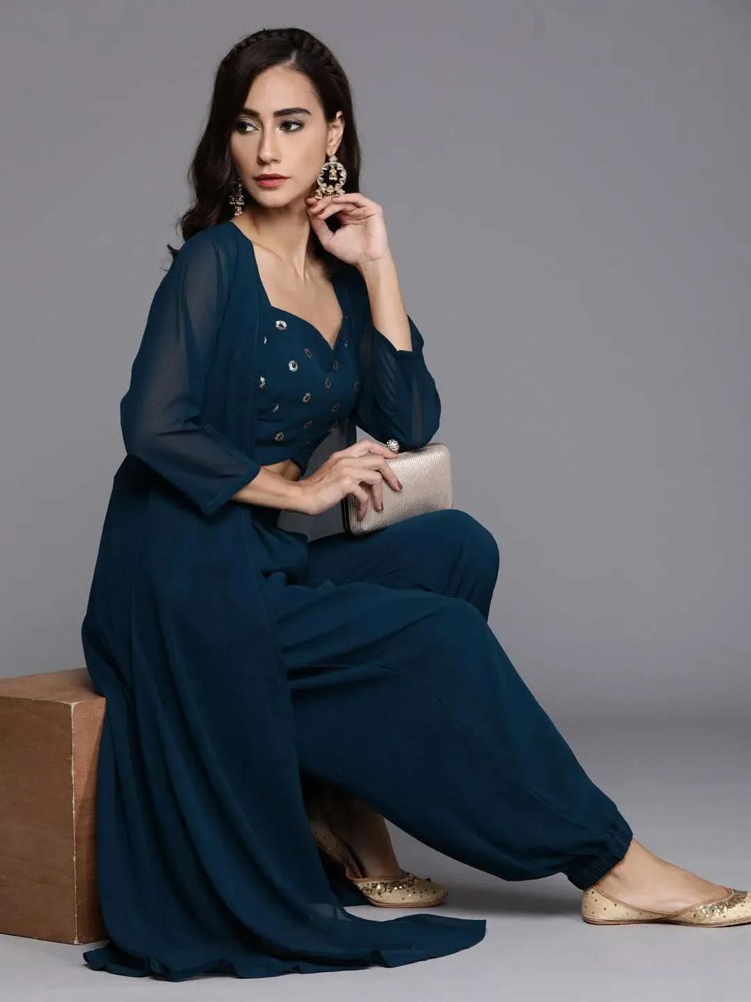 Blue Embroidered Georgette Straight Top With Salwar & Shrug
Blue Embroidered Georgette Straight Top With Salwar & Shrug