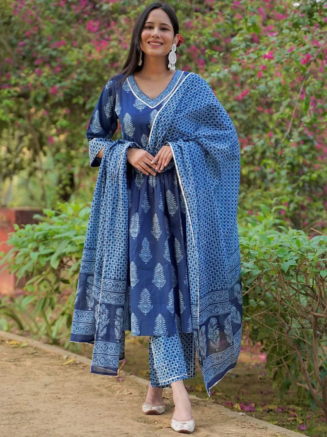 Blue Printed Cotton A-Line Kurta With Trousers & Dupatta
Blue Printed Cotton A-Line Kurta With Trousers & Dupatta