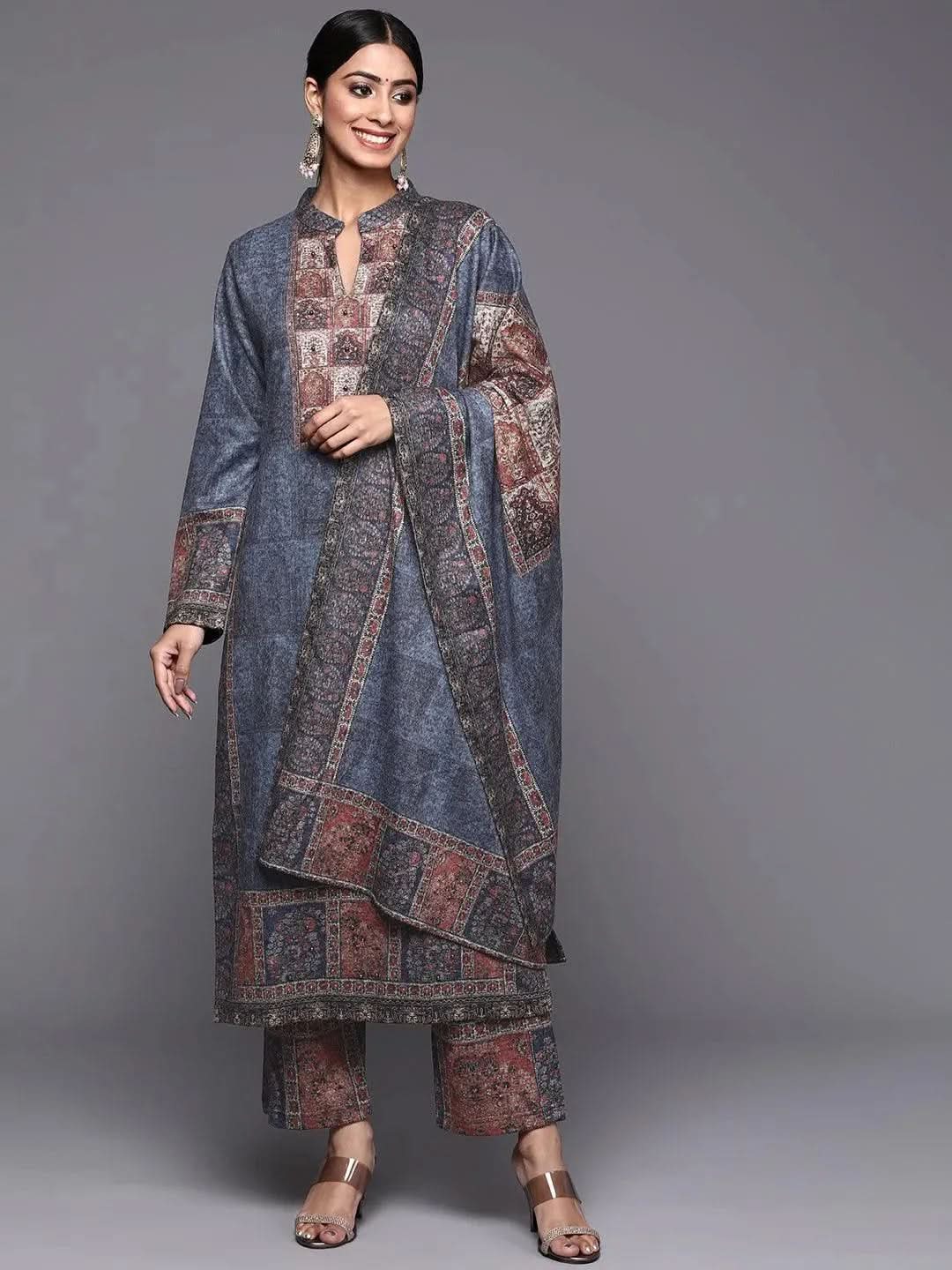 Blue Printed Wool Straight Kurta With Trousers & Dupatta
Blue Printed Wool Straight Kurta With Trousers & Dupatta