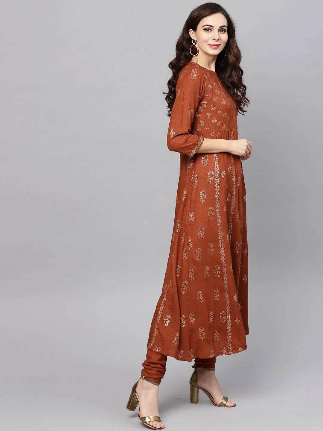 Brown Printed Rayon A-Line Kurta With Churidar & Dupatta
Brown Printed Rayon A-Line Kurta With Churidar & Dupatta