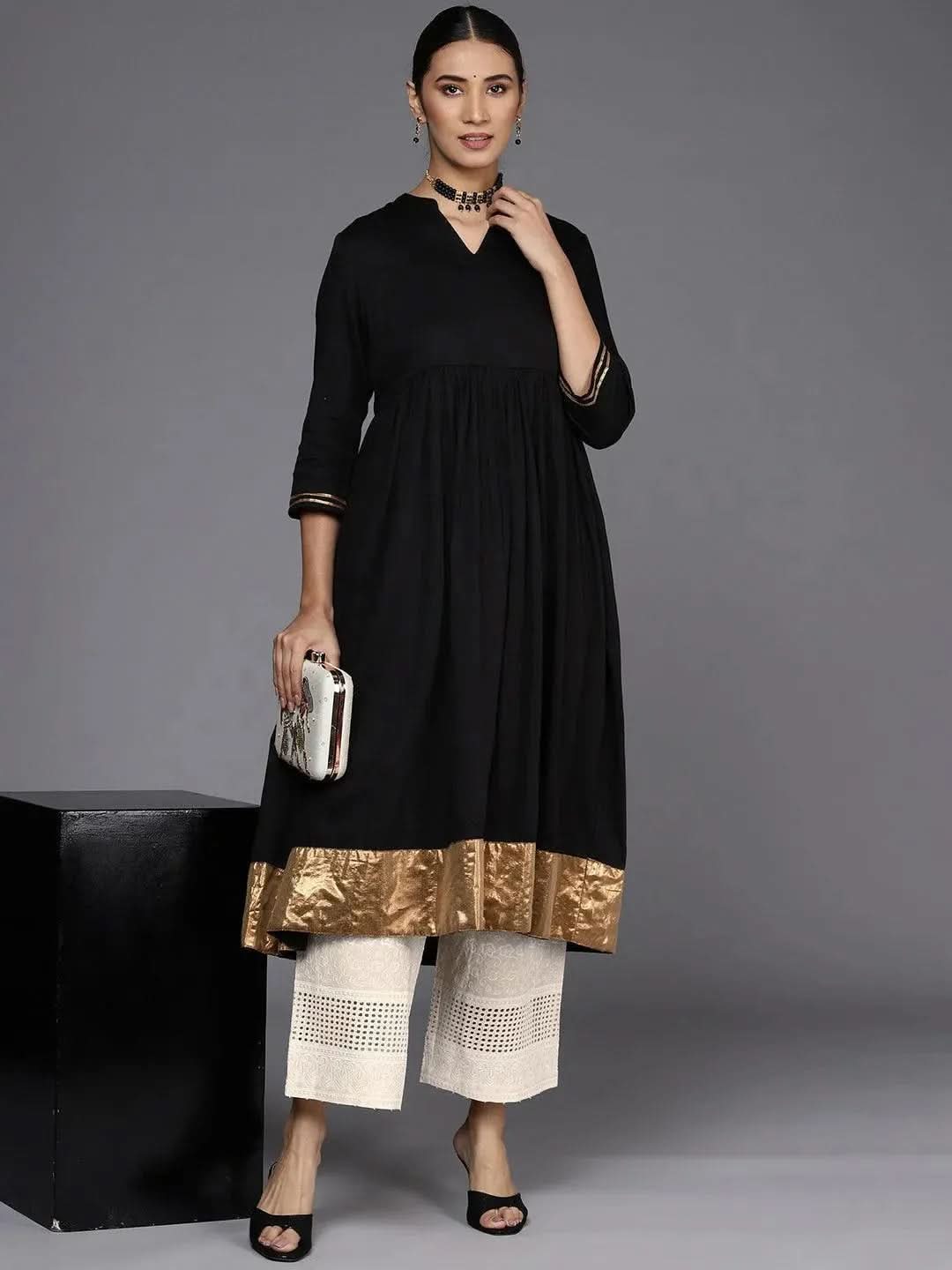 Cream Embroidered Cotton Palazzos
Cream Embroidered Cotton Palazzos