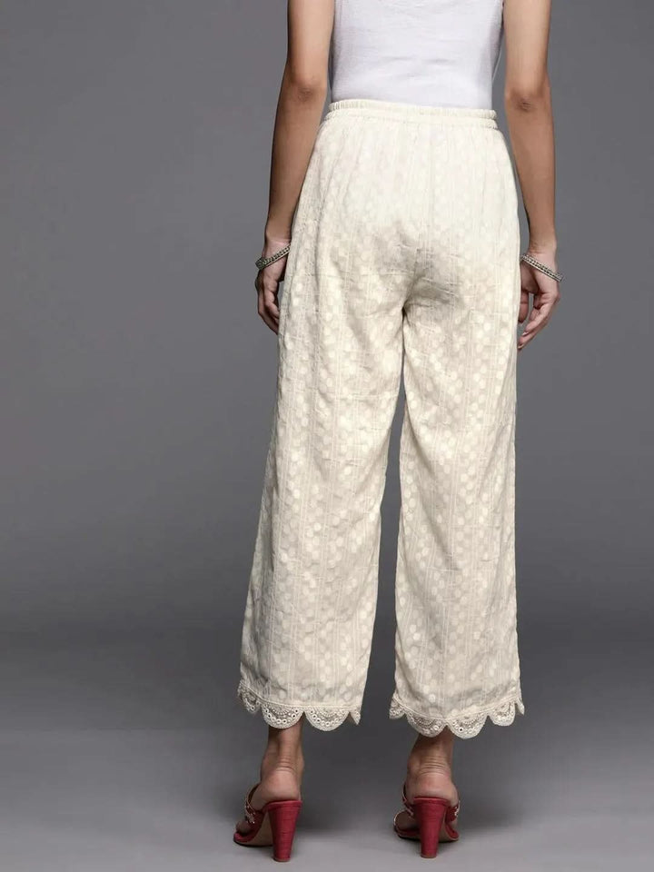 Cream Self Design Cotton Palazzos - Libas