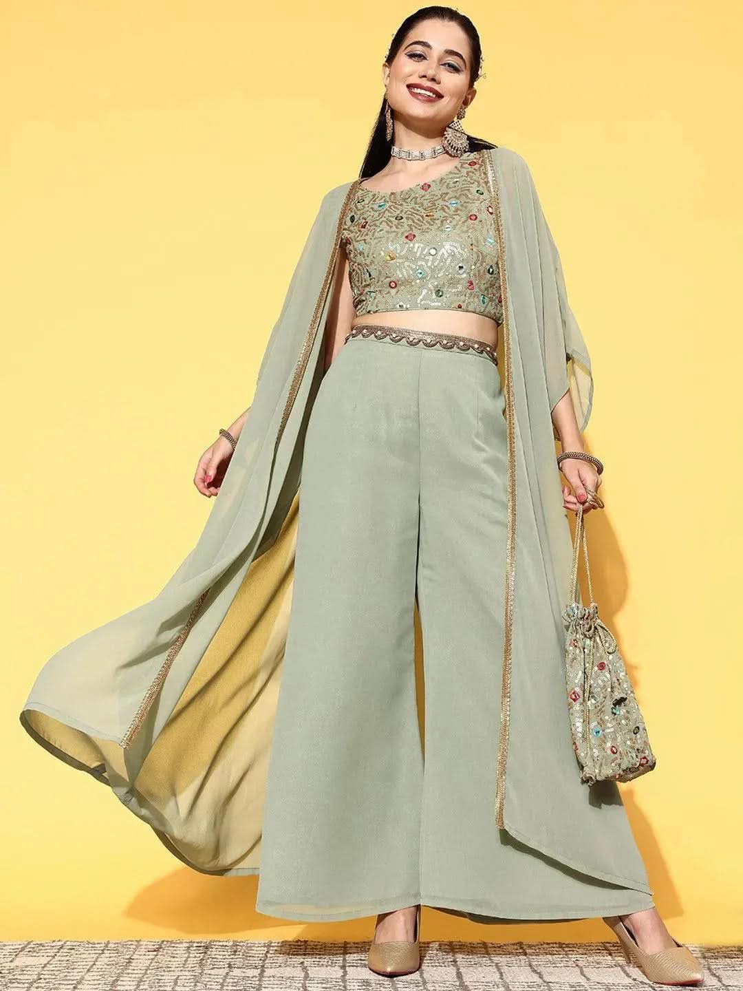 Green Embellished Georgette Top With Palazzos & Shrug
Green Embellished Georgette Top With Palazzos & Shrug