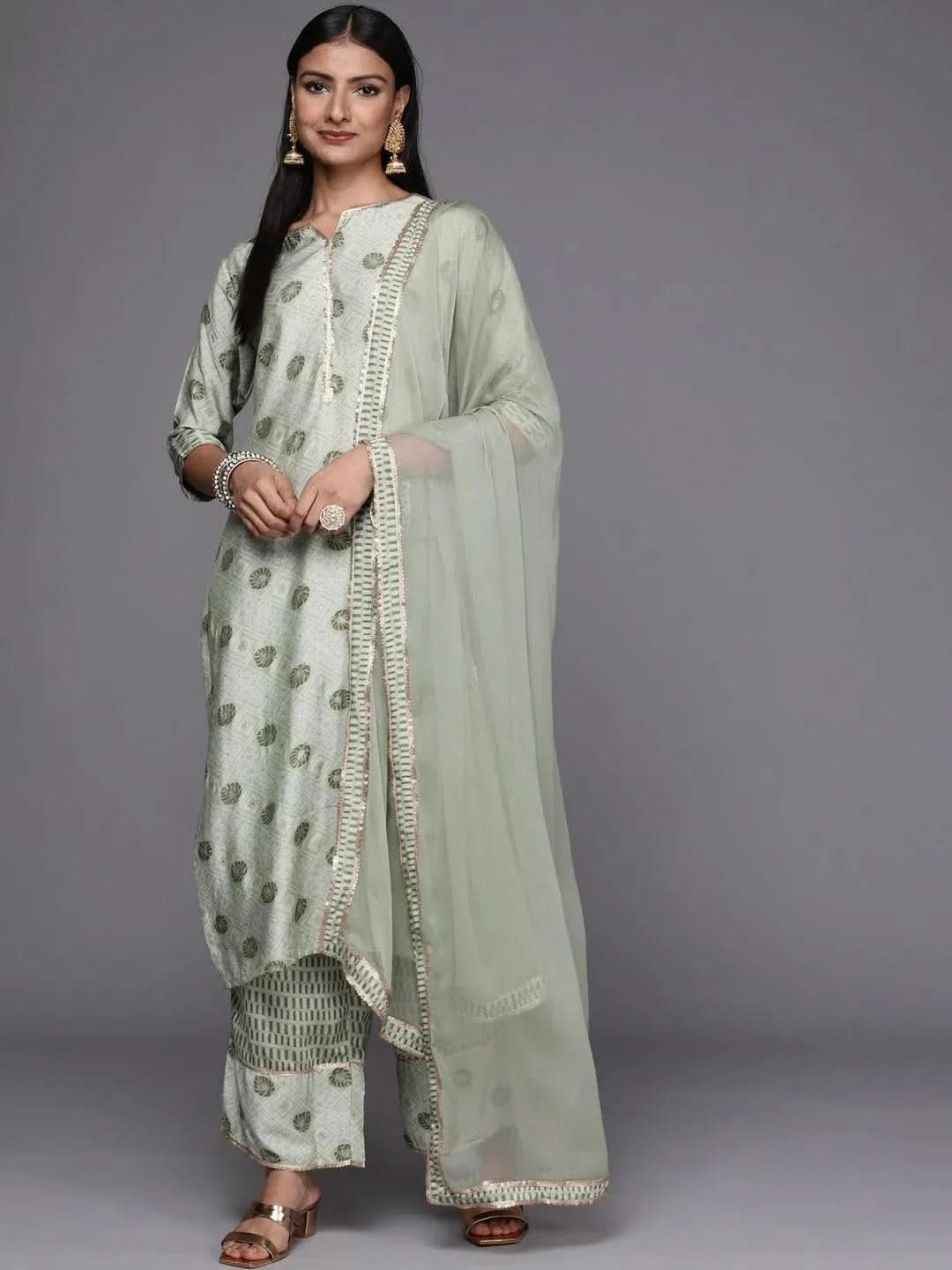 Green Printed Silk Blend Straight Kurta With Palazzos & Dupatta 
Green Printed Silk Blend Straight Kurta With Palazzos & Dupatta