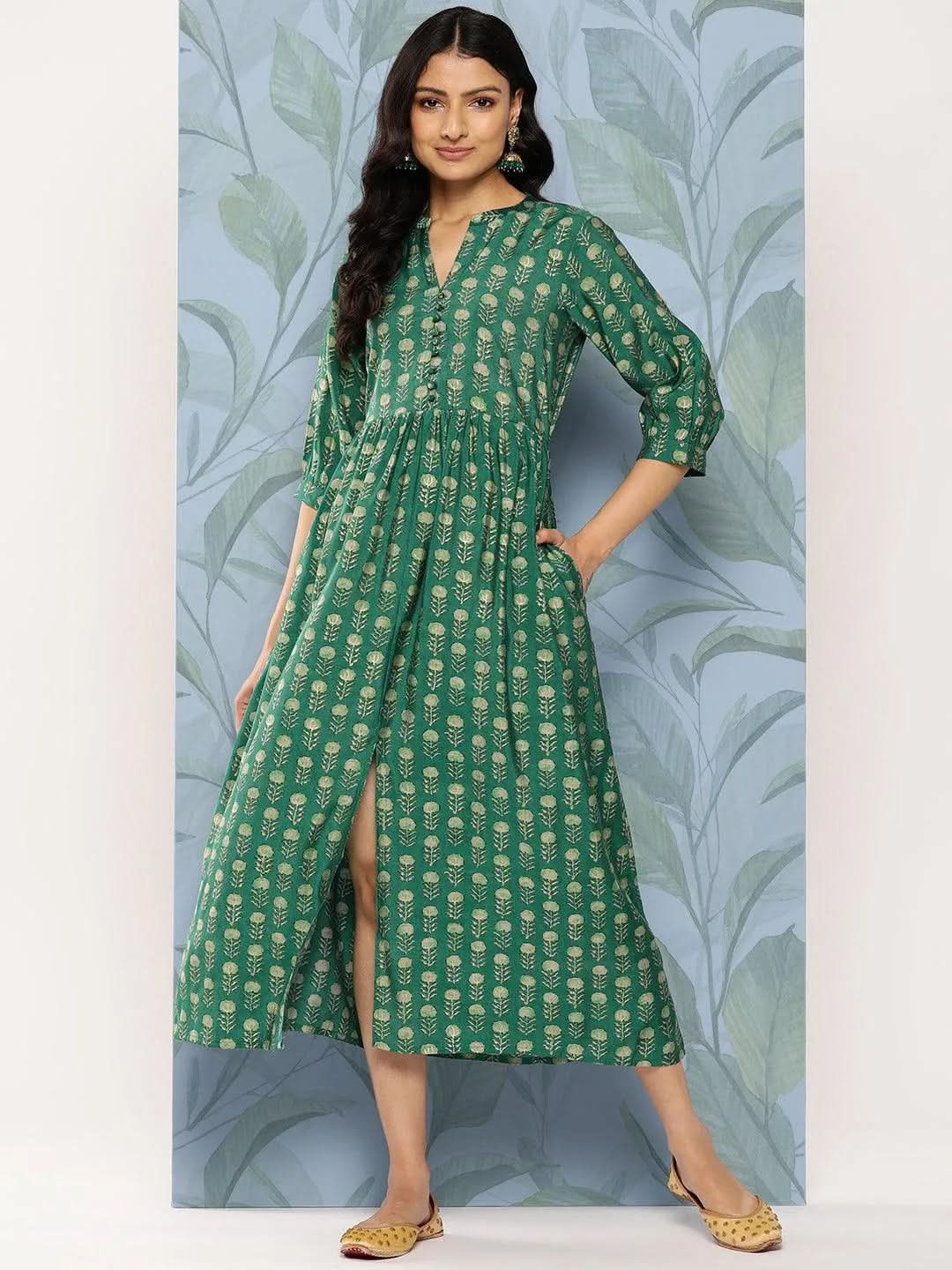 Women Green Printed Round Neck Viscose Rayon Fit And Flare Dress With Pockets
