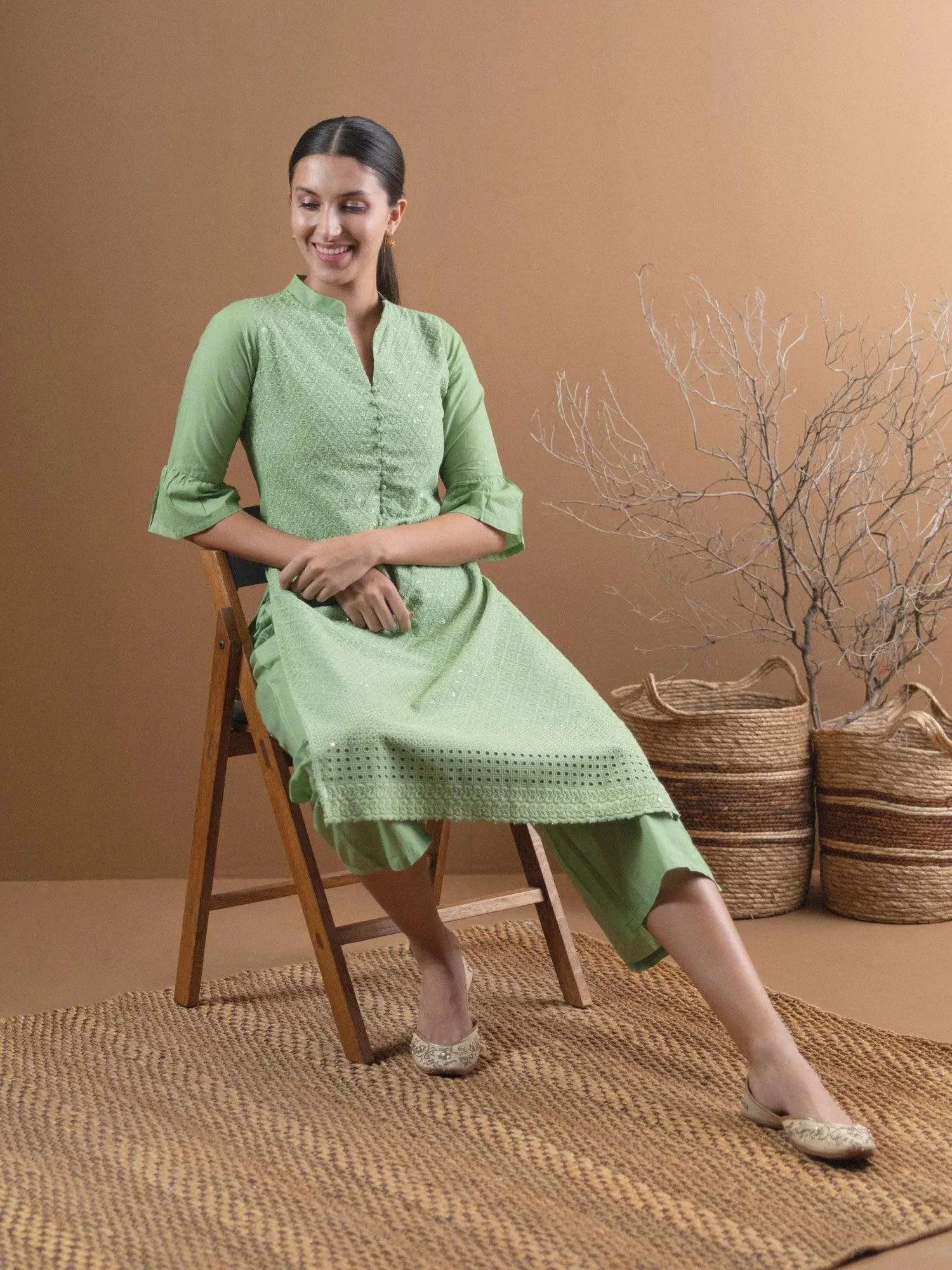 Green Schiffli Cotton Straight Kurta With Palazzos
Green Schiffli Cotton Straight Kurta With Palazzos