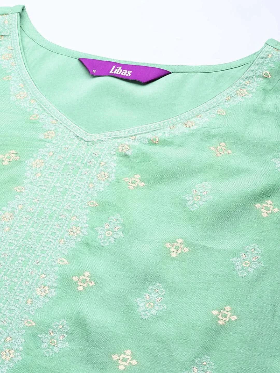 Green Self Design Silk Blend Straight Kurta With Trousers & Dupatta 
Green Self Design Silk Blend Straight Kurta With Trousers & Dupatta