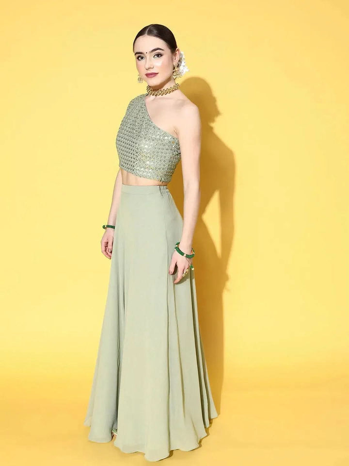 Green Sequinned Georgette Lehenga Set With Potli - Libas