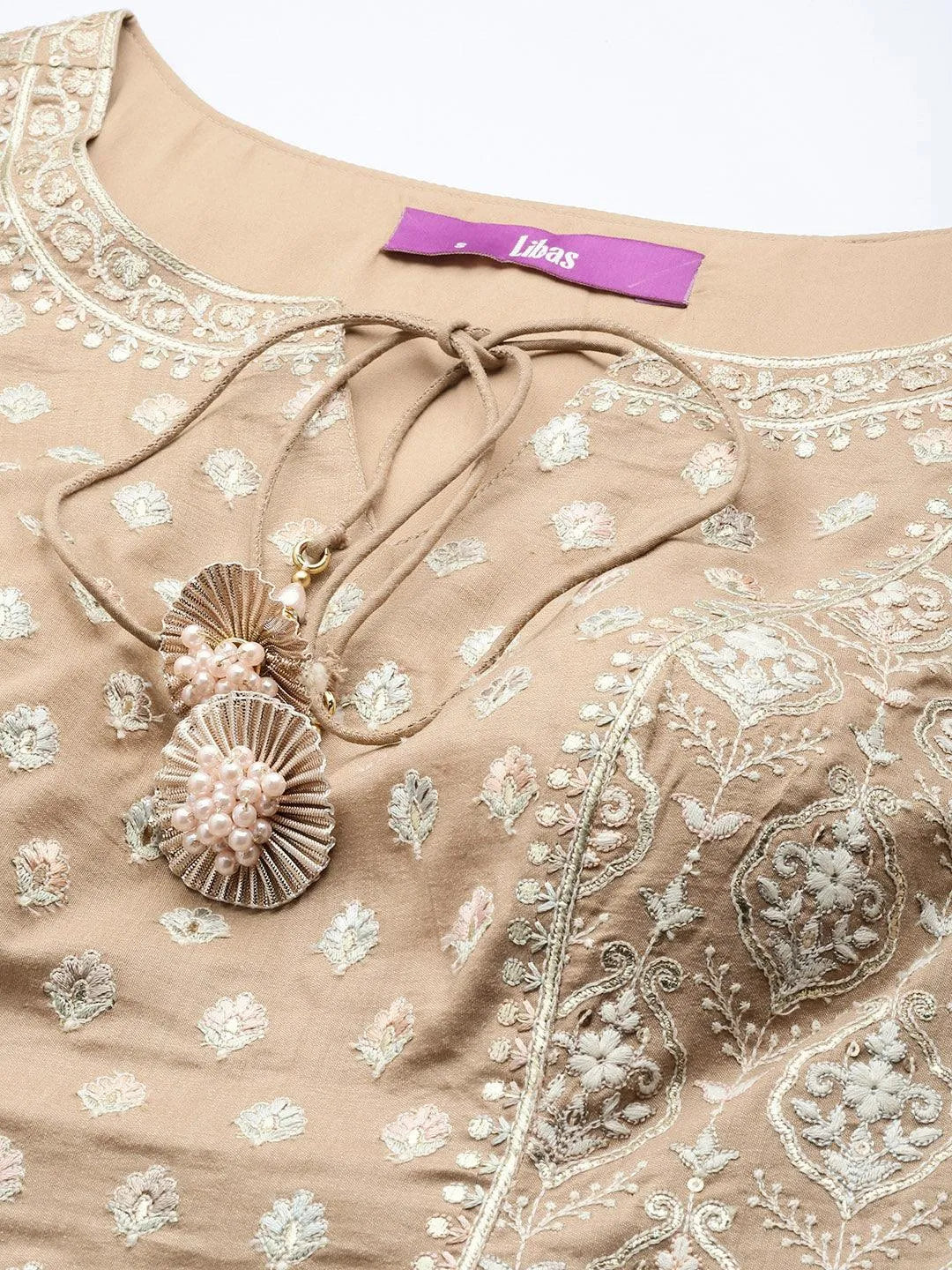 Libas Art Beige Embroidered Silk Straight Suit Set
Libas Art Beige Embroidered Silk Straight Suit Set