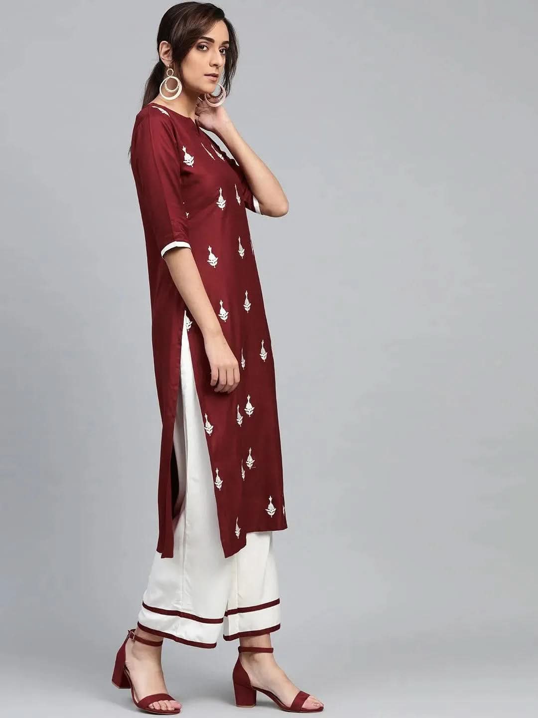 Maroon Embroidered Rayon Straight Kurta With Palazzos & Dupatta
Maroon Embroidered Rayon Straight Kurta With Palazzos & Dupatta