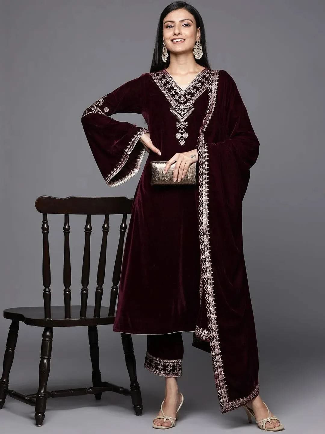 Maroon Embroidered Velvet A-Line Kurta With Trousers & Dupatta
Maroon Embroidered Velvet A-Line Kurta With Trousers & Dupatta