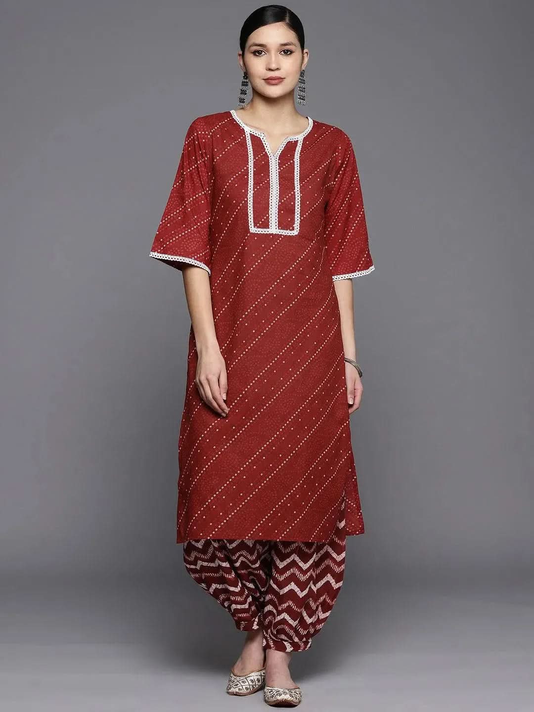 Maroon Printed Cotton Straight Kurta With Salwar
Maroon Printed Cotton Straight Kurta With Salwar