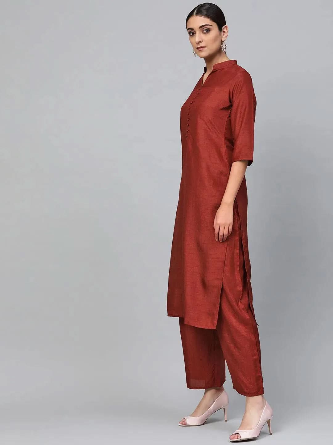 Maroon Solid Silk Straight Kurta With Palazzos & Dupatta
Maroon Solid Silk Straight Kurta With Palazzos & Dupatta