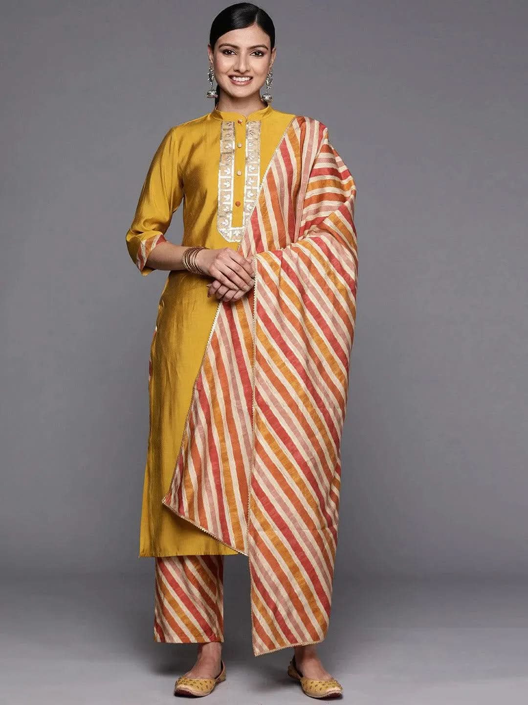 Mustard Embroidered Silk Blend Straight Kurta With Trousers & Dupatta
Mustard Embroidered Silk Blend Straight Kurta With Trousers & Dupatta
