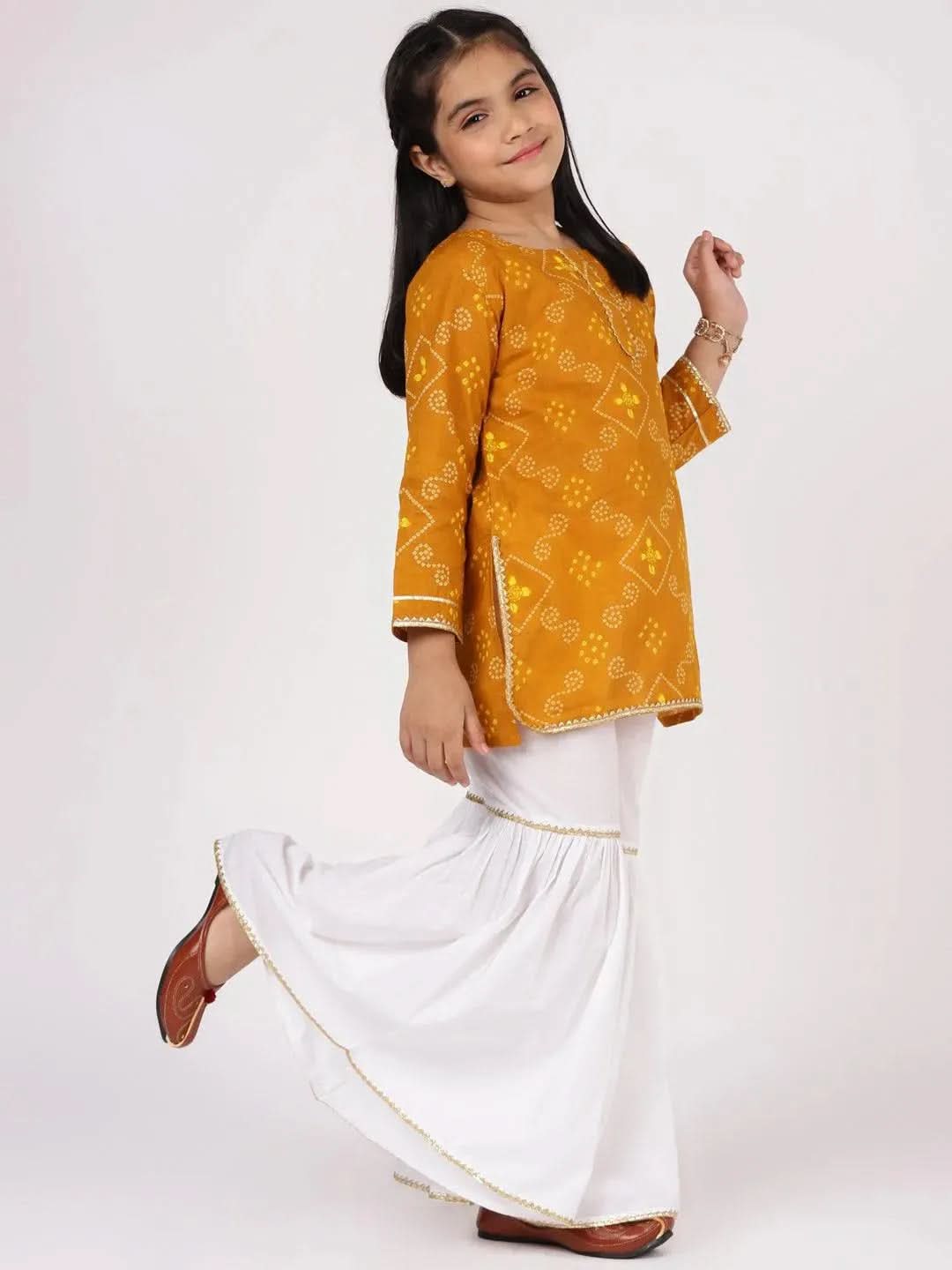 Mustard Printed Cotton Straight Kurta With Sharara & Dupatta 
Mustard Printed Cotton Straight Kurta With Sharara & Dupatta