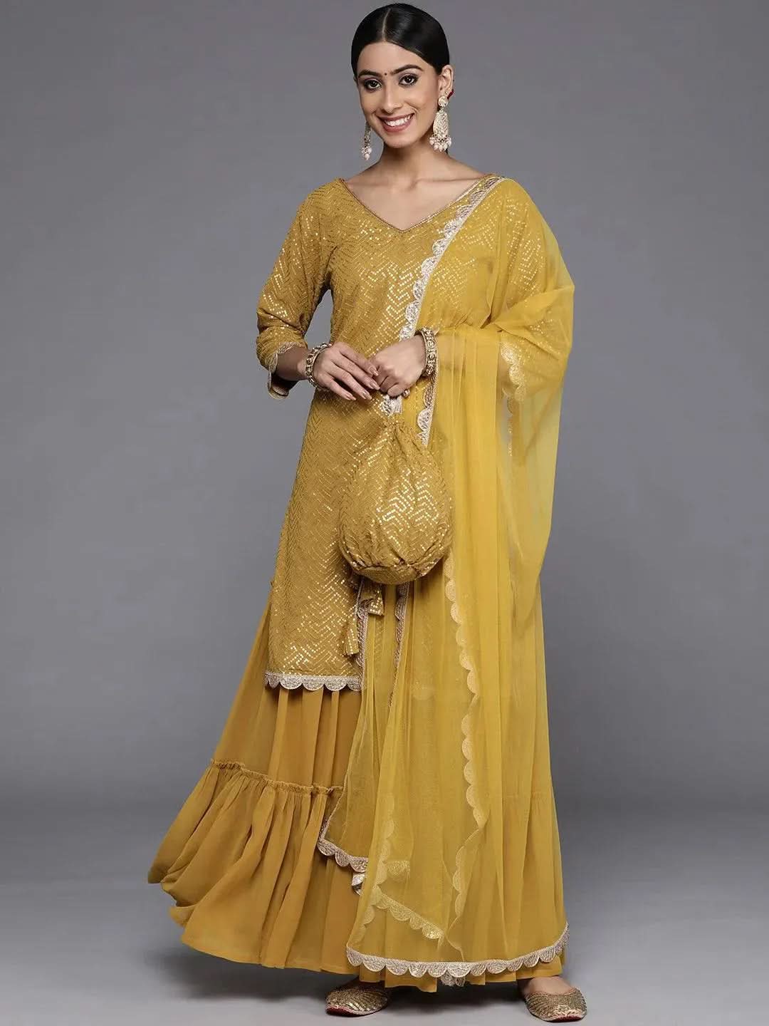 Mustard Sequinned Georgette Straight Sharara Suit Set With Dupatta
Mustard Sequinned Georgette Straight Sharara Suit Set With Dupatta