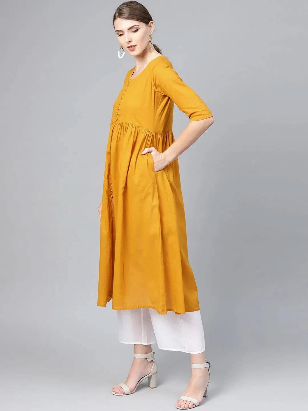 Mustard Solid Cotton A-Line Kurta With Palazzos & Dupatta
Mustard Solid Cotton A-Line Kurta With Palazzos & Dupatta