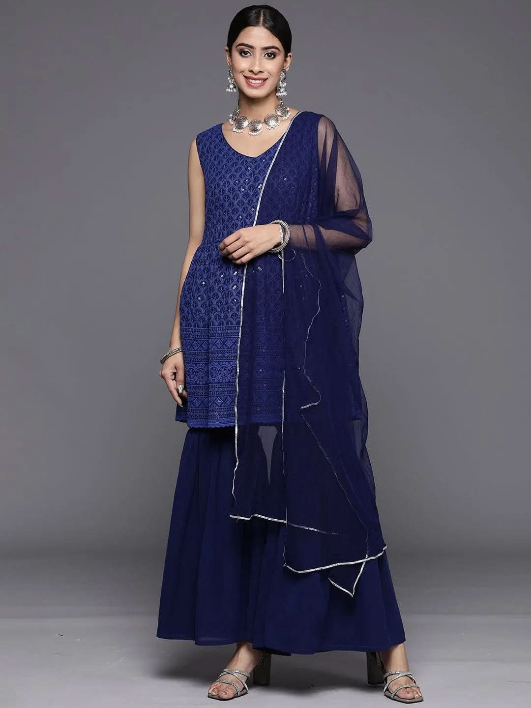 Navy Blue Embroidered Georgette A-Line Sharara Suit Set With Dupatta
Navy Blue Embroidered Georgette A-Line Sharara Suit Set With Dupatta