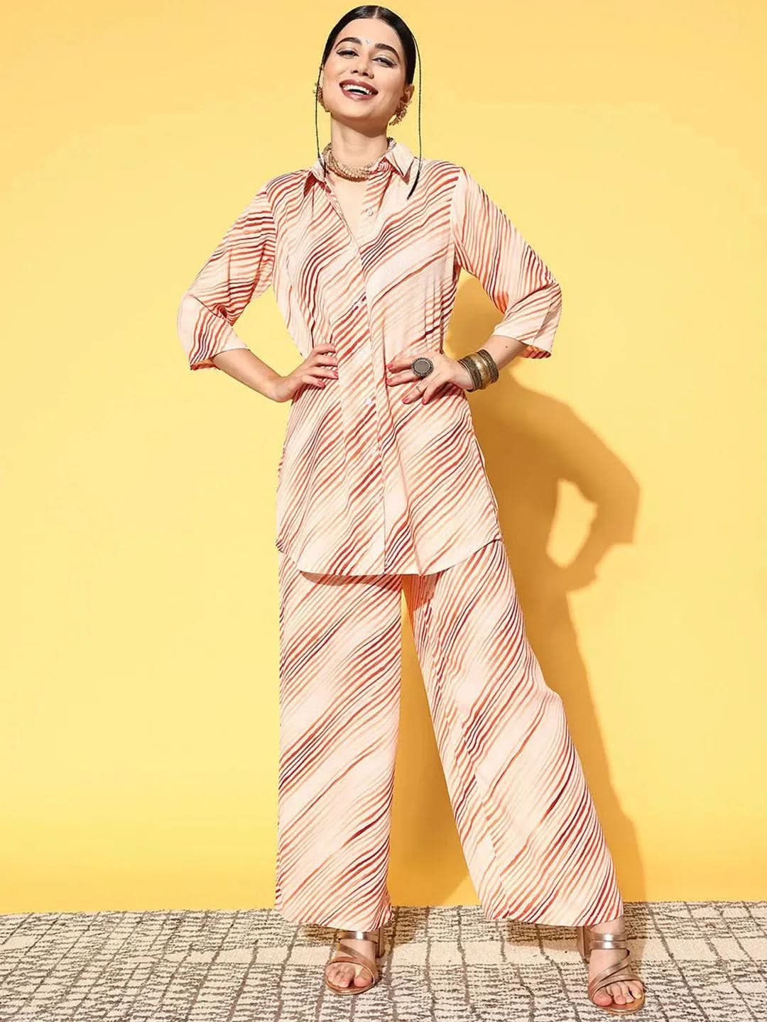 Peach Printed Georgette Shirt With Palazzos
Peach Printed Georgette Shirt With Palazzos