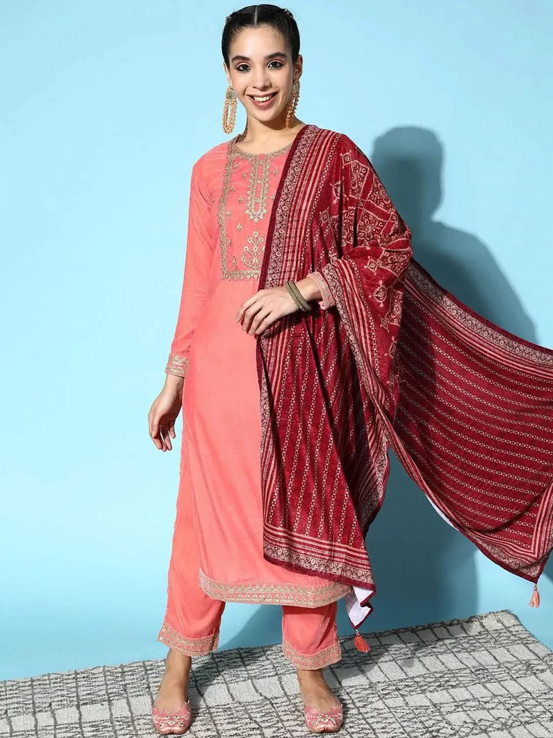 Peach Yoke Design Velvet Straight Kurta With Trousers & Dupatta
Peach Yoke Design Velvet Straight Kurta With Trousers & Dupatta