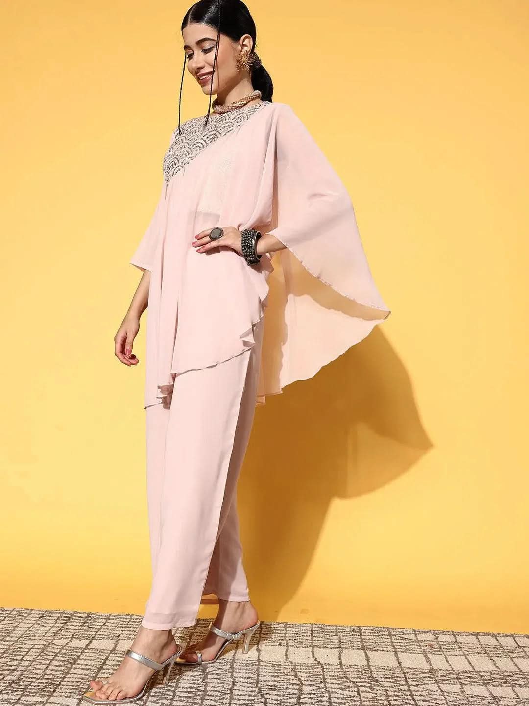 Pink Embellished Georgette Top With Palazzos
Pink Embellished Georgette Top With Palazzos