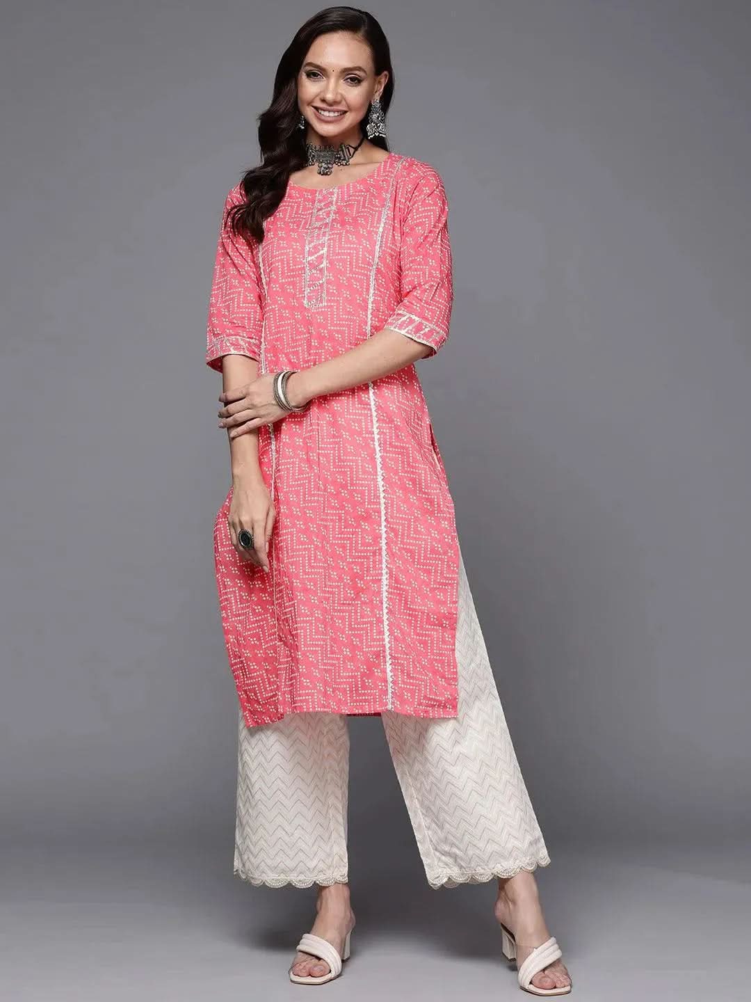 Pink Printed Cotton Straight Kurta 
Pink Printed Cotton Straight Kurta