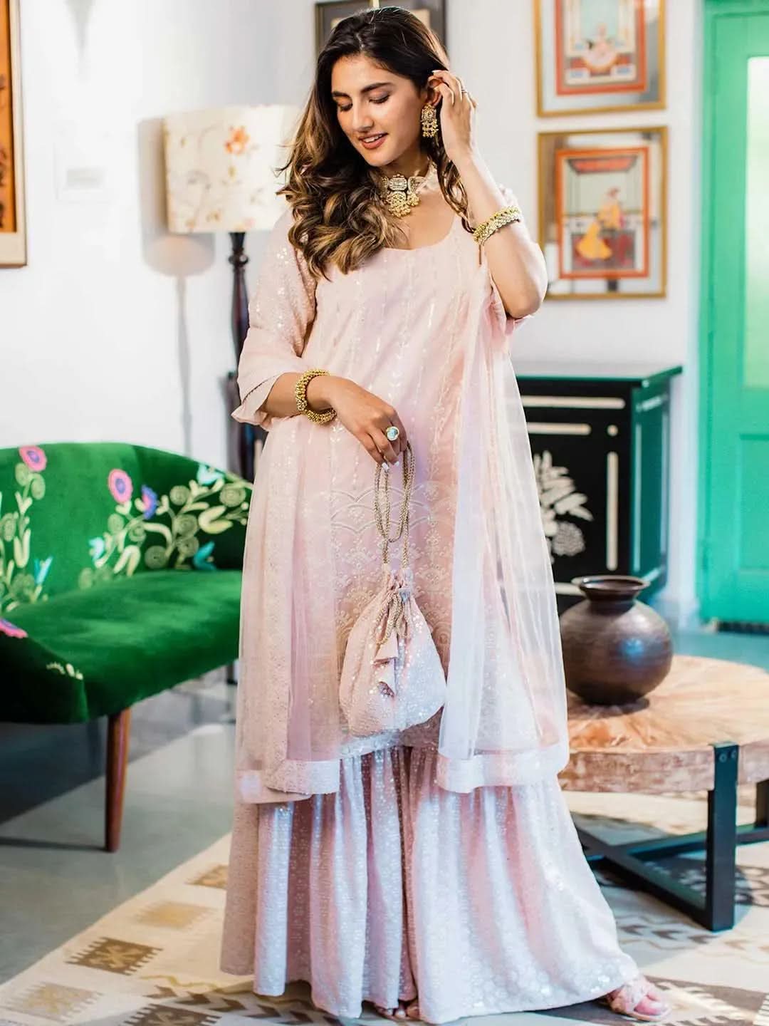 Pink Sequinned Georgette Straight Suit Set With Potli - Libas