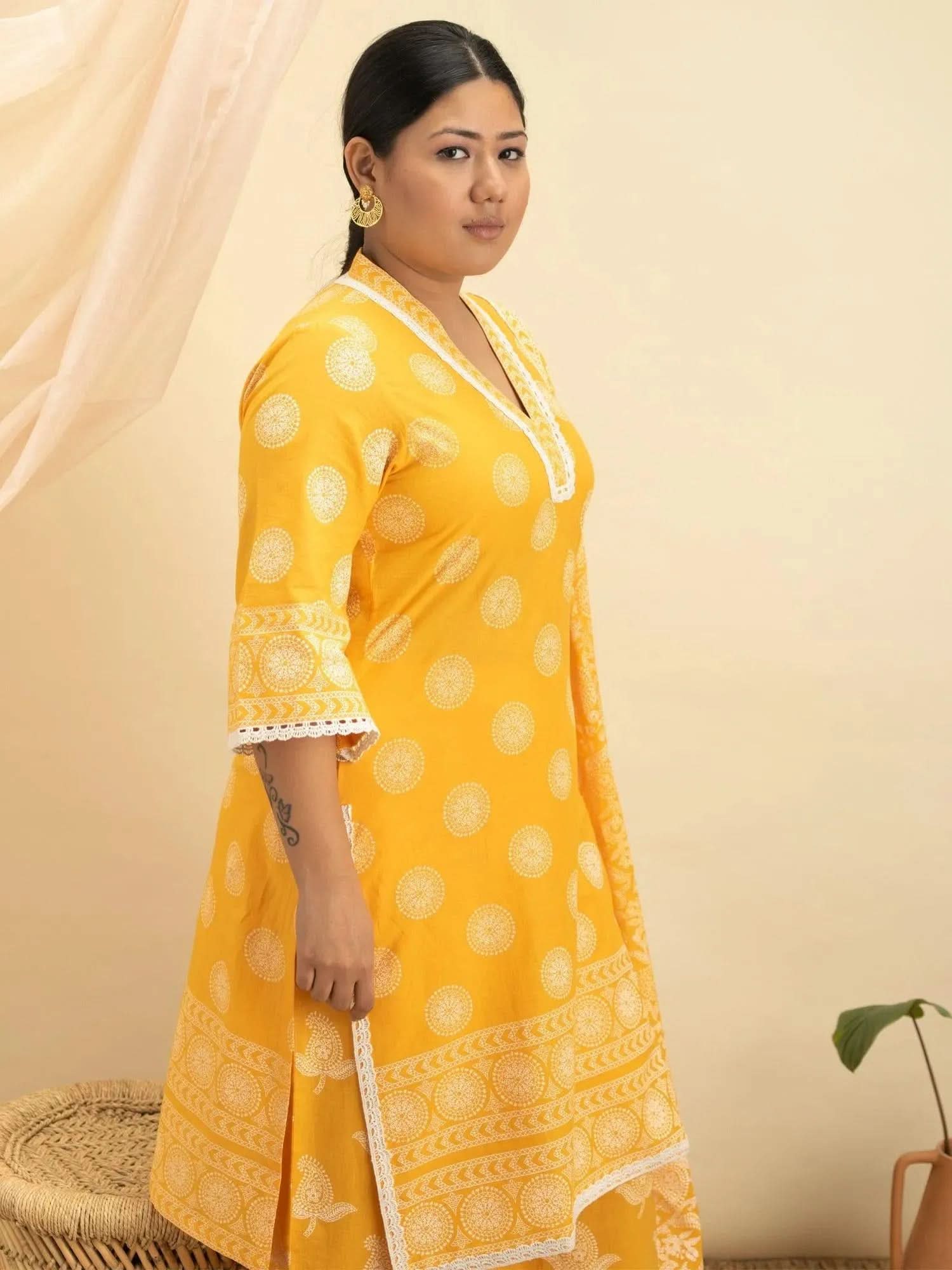 Buy Yellow Cotton Printed Straight Kurta With Cotton Sharara And Dupatta Online 
Buy Yellow Cotton Printed Straight Kurta With Cotton Sharara And Dupatta Online