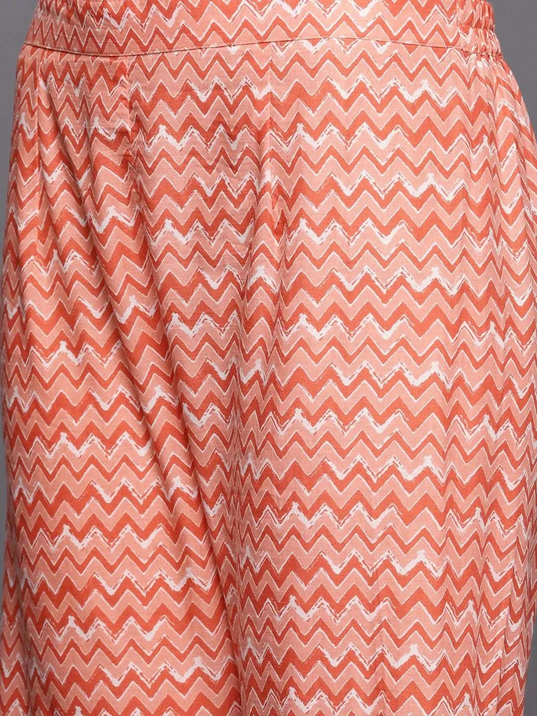 Tan Printed Cotton Anarkali Kurti With Sharara & Dupatta 
Tan Printed Cotton Anarkali Kurti With Sharara & Dupatta