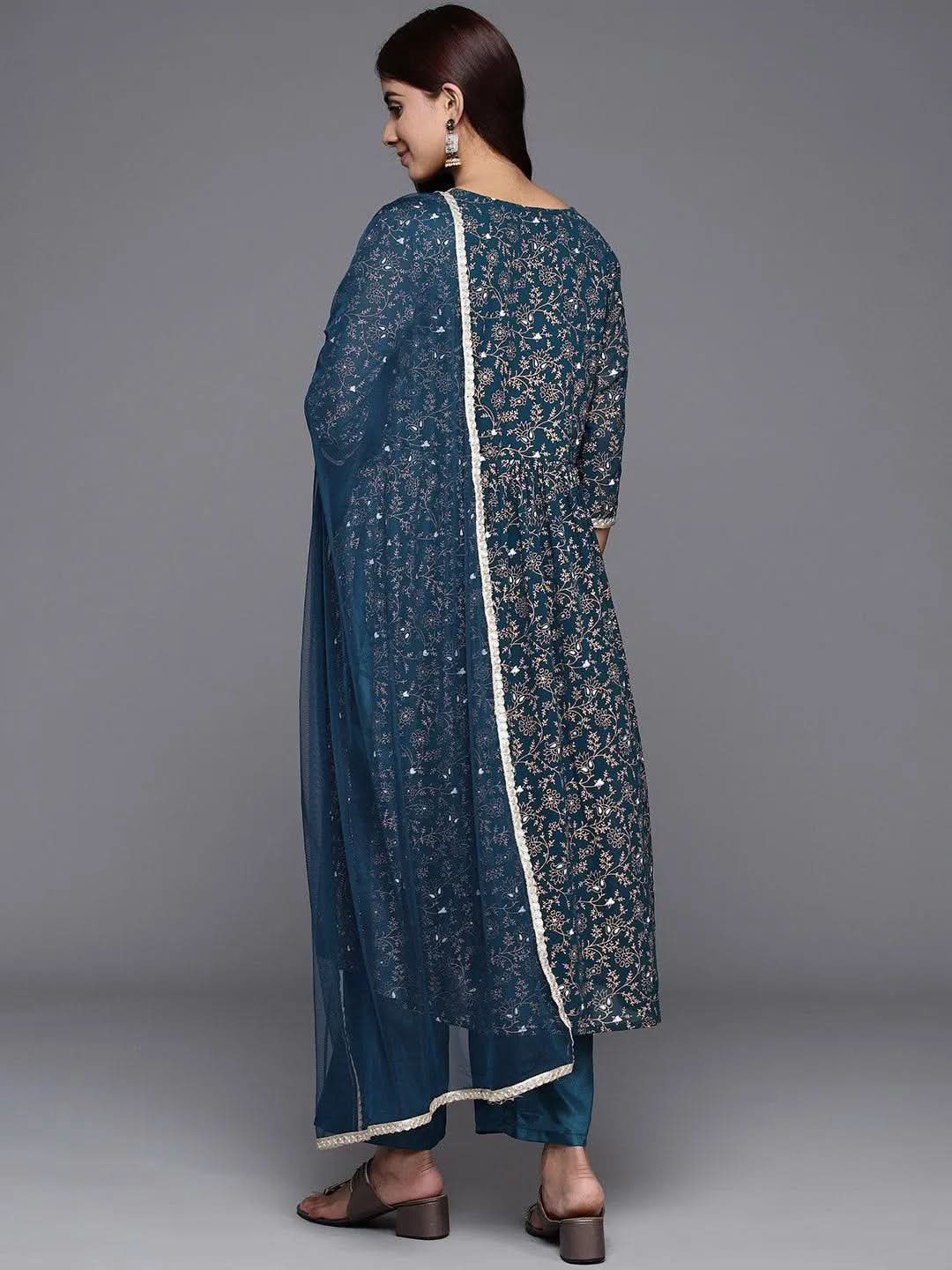 Teal Printed Georgette A-Line Kurta With Trousers & Dupatta
Teal Printed Georgette A-Line Kurta With Trousers & Dupatta
