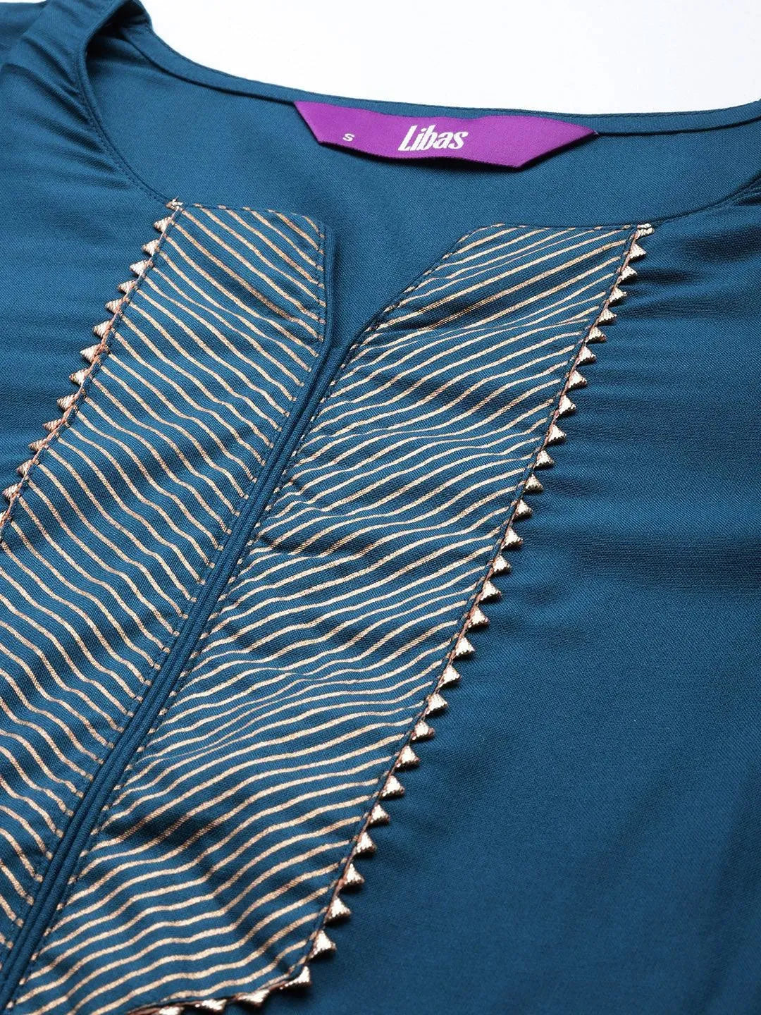 Buy Teal Solid Viscose Rayon Suit Set - 20195-XS | Libas Ethnic Wear Online
Buy Teal Solid Viscose Rayon Suit Set - 20195-XS | Libas Ethnic Wear Online