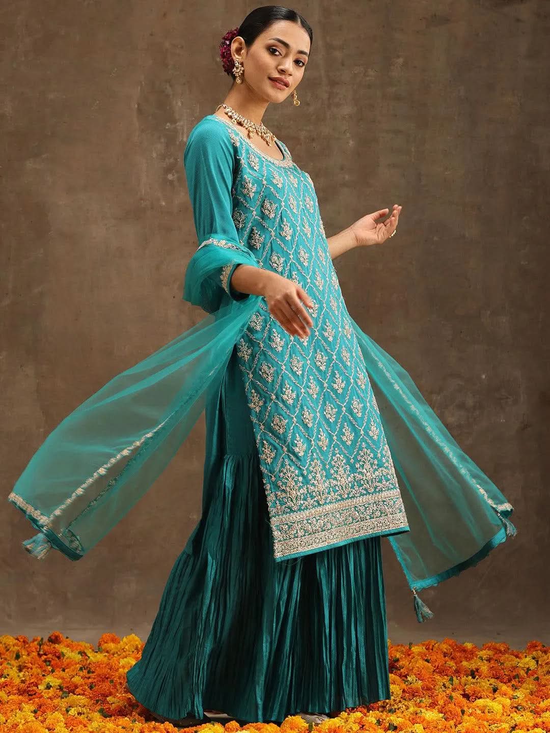 Turquoise Blue Embroidered Silk Blend Straight Sharara Suit Set With Dupatta
Turquoise Blue Embroidered Silk Blend Straight Sharara Suit Set With Dupatta