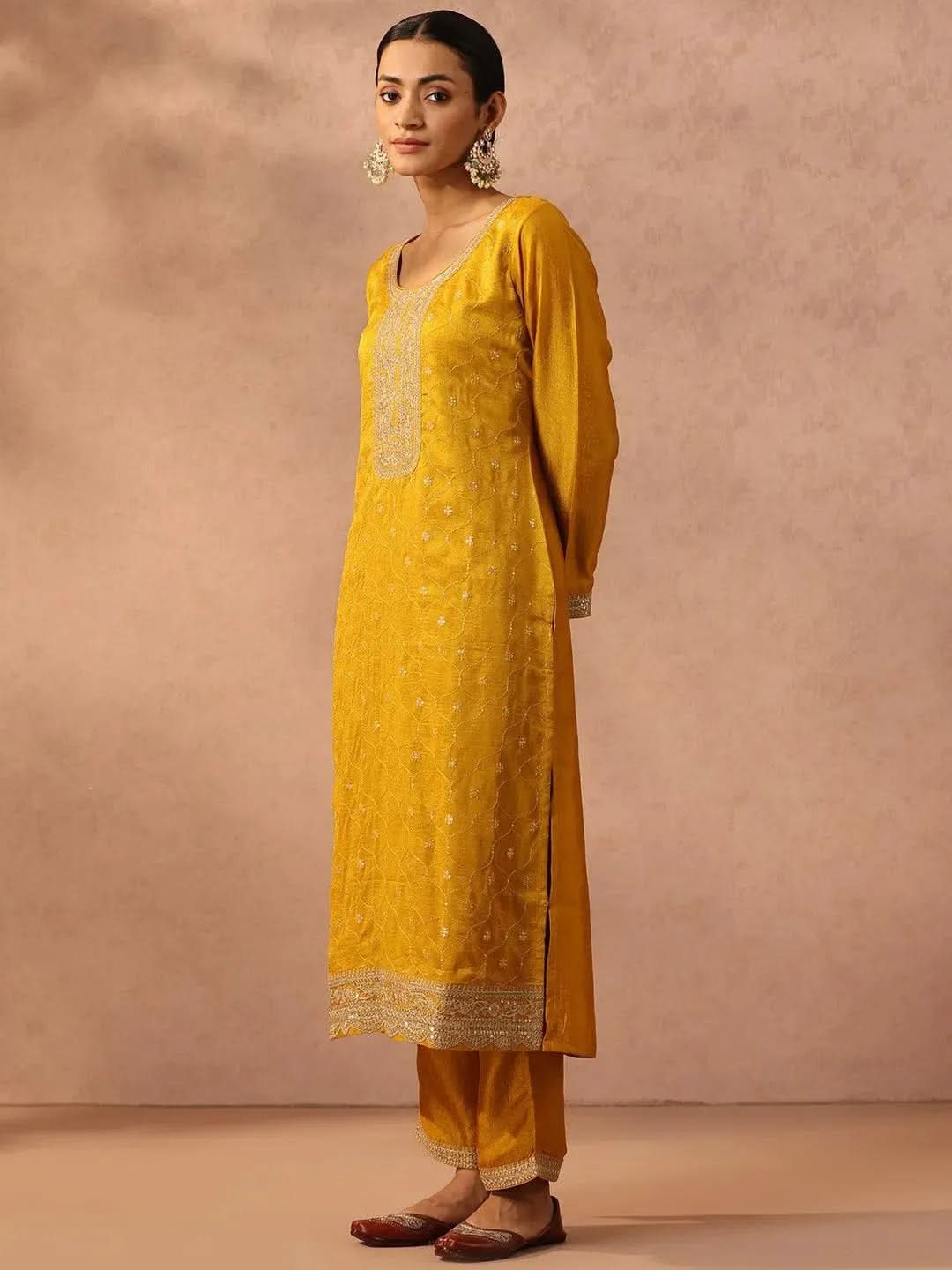 Yellow Embroidered Silk Blend Straight Kurta With Trousers & Dupatta
Yellow Embroidered Silk Blend Straight Kurta With Trousers & Dupatta