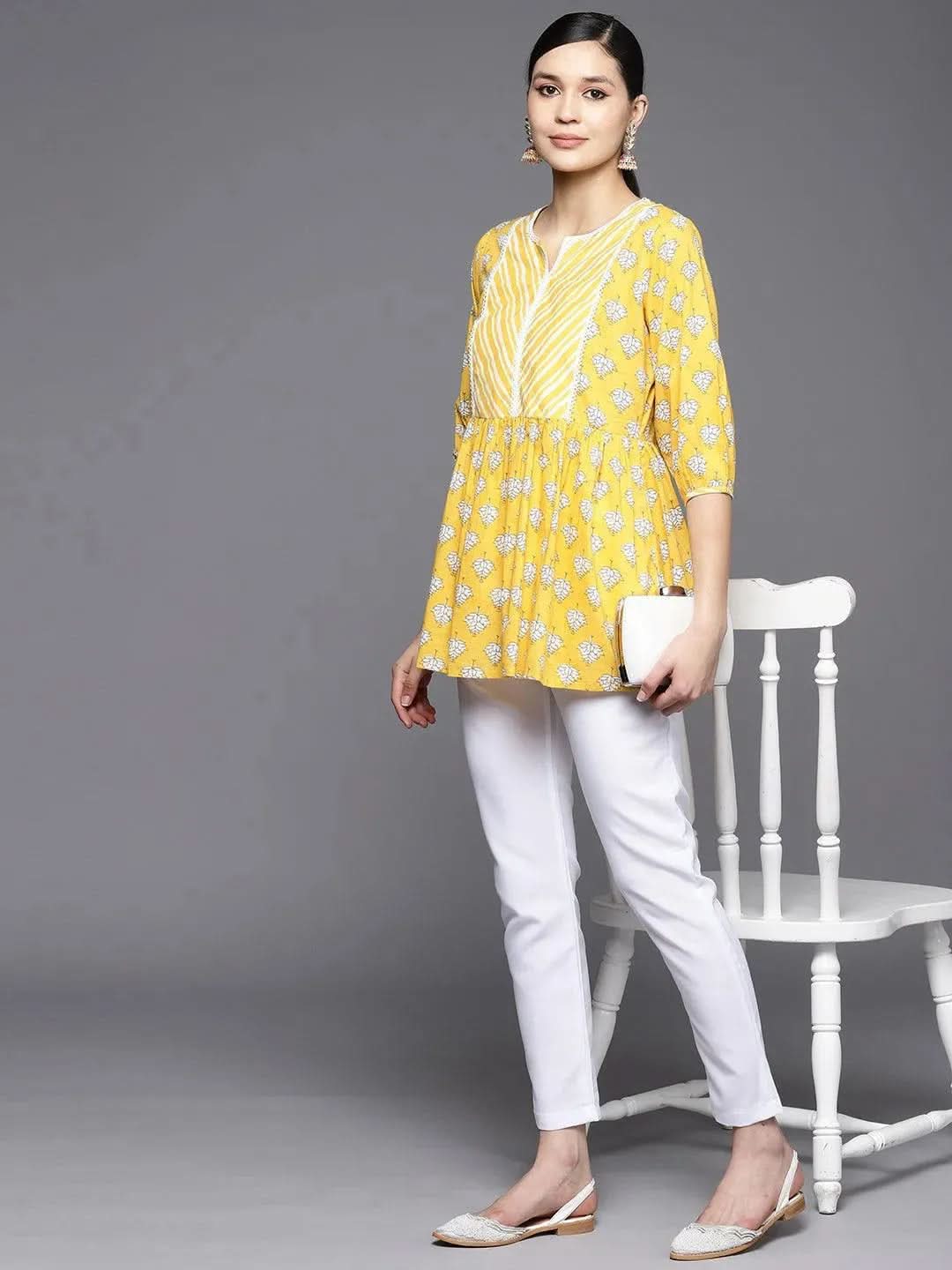 Yellow Printed Cotton A-Line Kurti
Yellow Printed Cotton A-Line Kurti