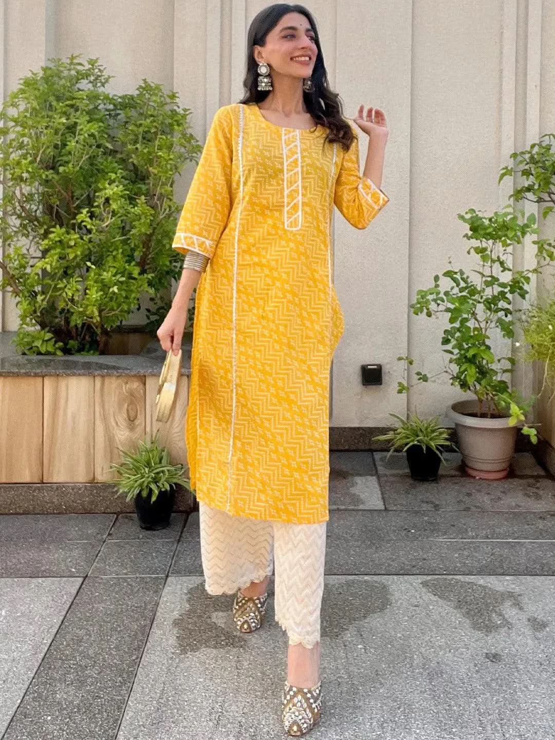Yellow Printed Cotton Straight Kurta 
Yellow Printed Cotton Straight Kurta