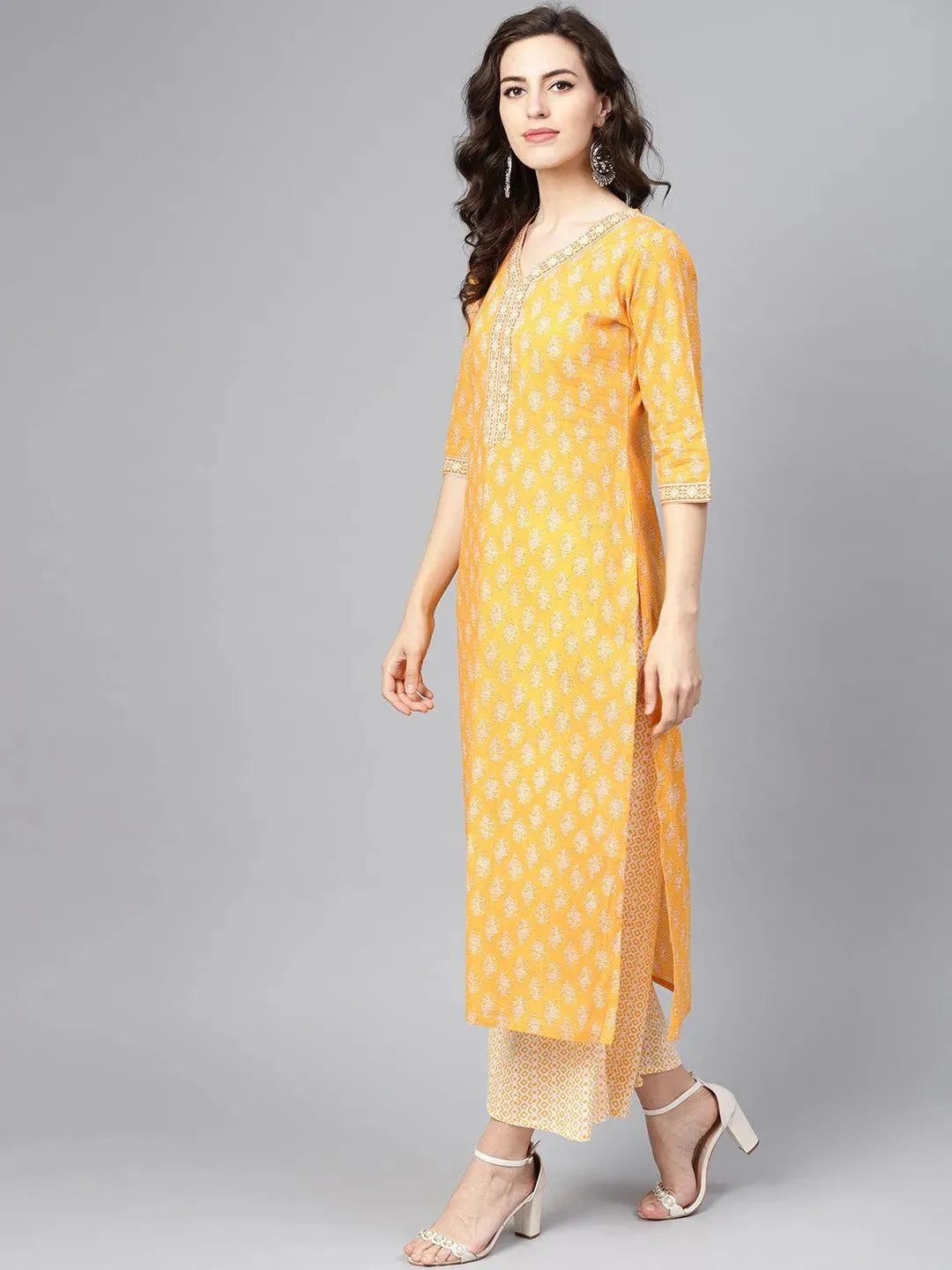Yellow Printed Cotton Straight Kurta With Palazzos & Dupatta
Yellow Printed Cotton Straight Kurta With Palazzos & Dupatta