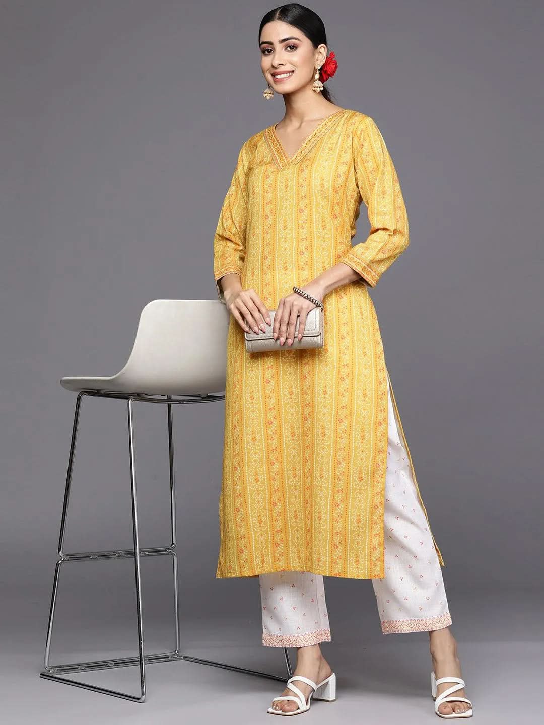 Yellow Printed Cotton Straight Kurta With Trousers
Yellow Printed Cotton Straight Kurta With Trousers