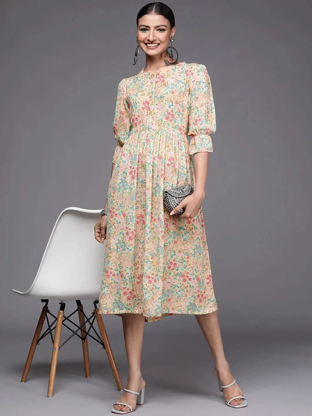 Yellow Printed Georgette Fit and Flared Dress
Yellow Printed Georgette Fit and Flared Dress