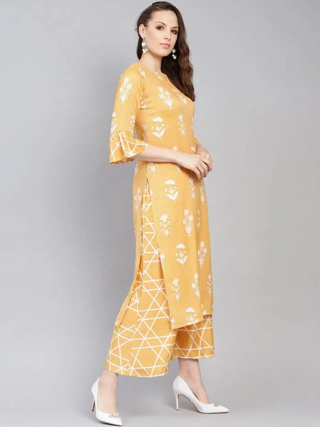Yellow Printed Linen Straight Kurta With Palazzos
Yellow Printed Linen Straight Kurta With Palazzos