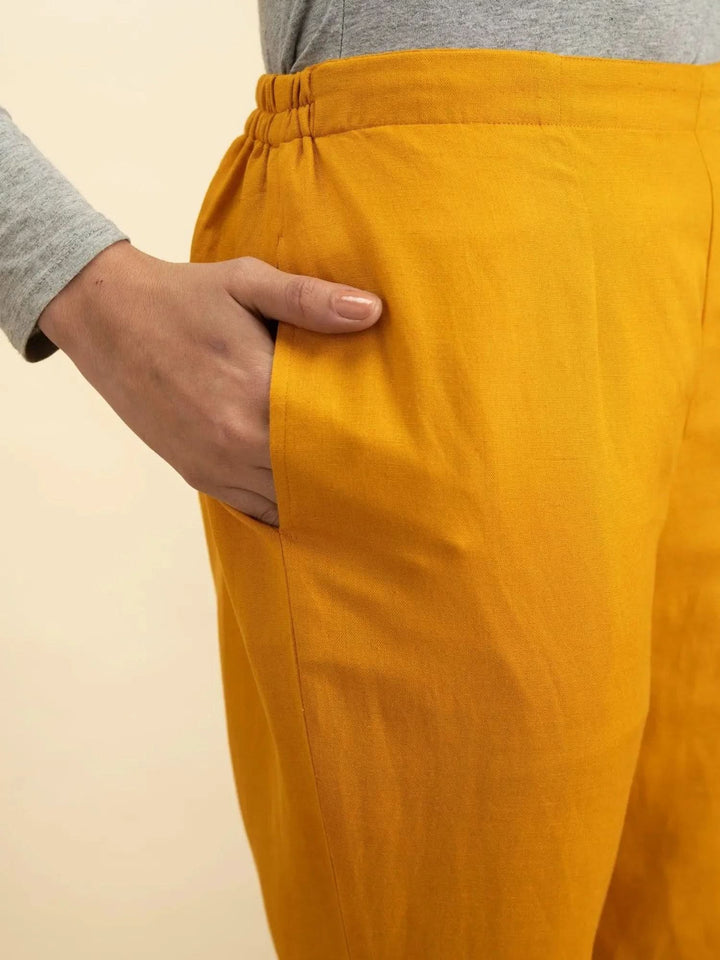 Yellow Solid Cotton Trousers - Libas