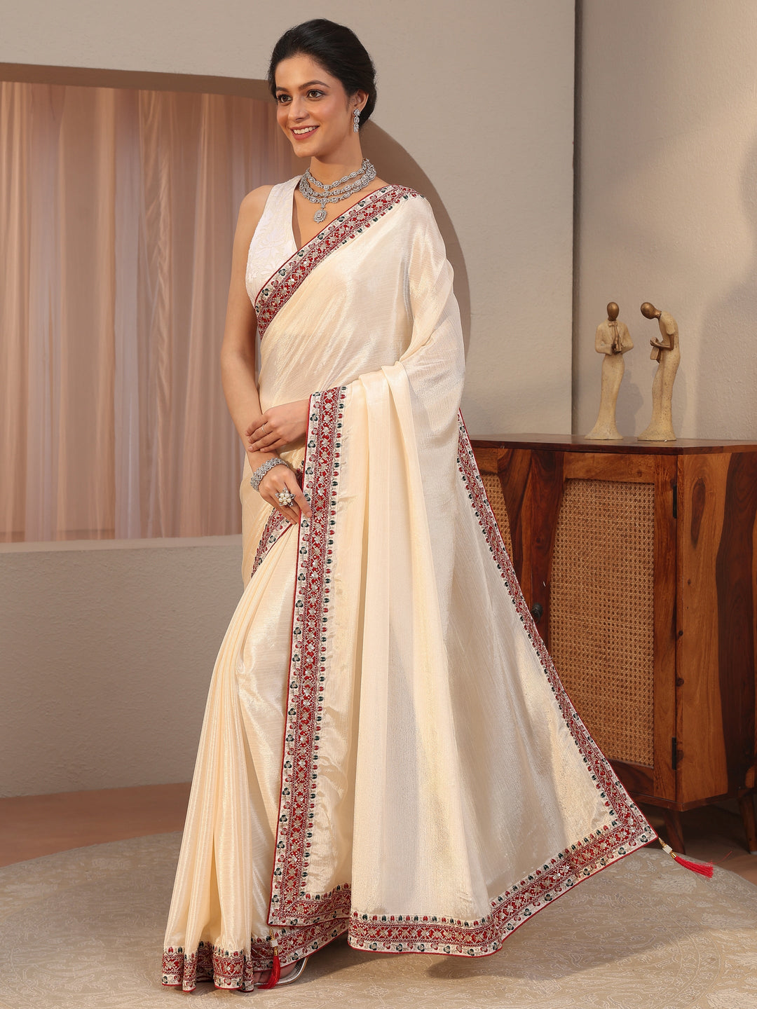  Cream Chiffon Saree With Embroidered Border 