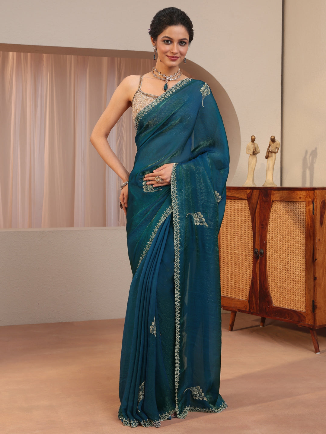  Peacock Blue Tissue Saree With Embellished Leaf Motifs 